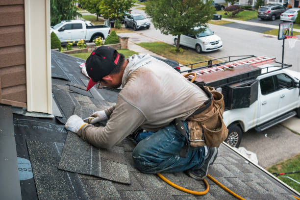 Professional Gutter Repair And Installation technician working in Sayville, NY